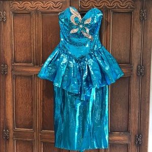 Vintage 1990 formal teal sequence and a train.